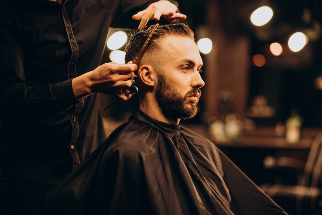 young man at barbershop trimming hair and discover what to ask for at barbershop